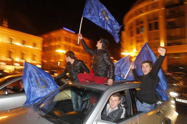 Georgians drive through the capital, Tbilisi, to celebrate the election of Georgy Margvelashvili as president. Margvelashvili, a close ally of Prime Minister Bidzina Ivanishvili, was expected to get about 67 percent of the vote yesterday.