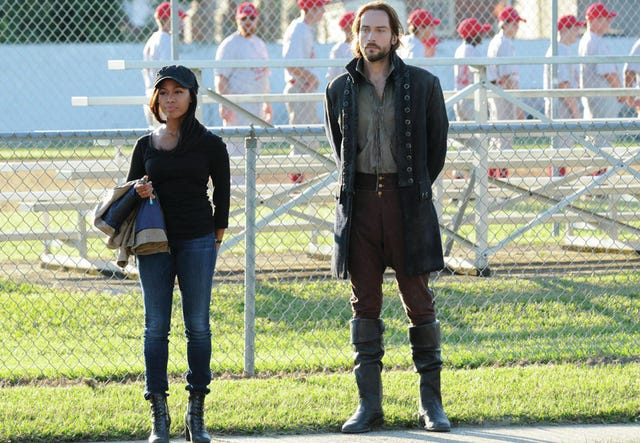 In this Sept. 26 photo provided by Fox, the stars of “Sleepy Hollow” appear in a scene from the TV show. Nicole Beharie, left, plays police Lt. Abbie Mills and Tom Mison plays Ichabod Crane. The new show, inspired by the tale of the Headless Horseman, has spurred interest in the village of Sleepy Hollow, N.Y. AP Photo/Fox