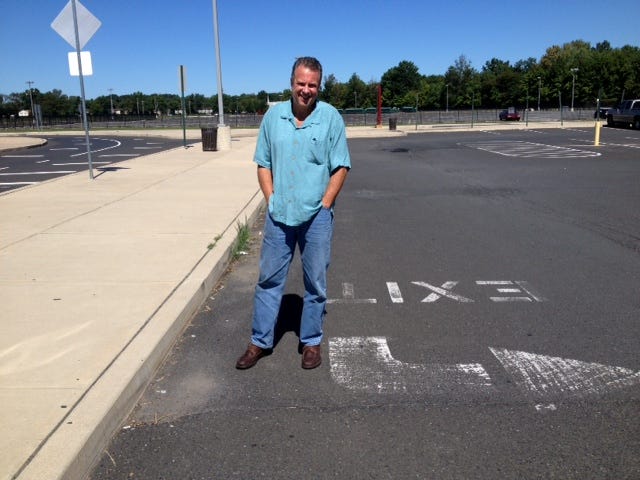 Steve Urbish, in the parking lot of Parx East casino in Bensalem, where he was ticketed for parking in a non-designated spot. The district judge tossed out the ticket, agreeing that the township must mark "no parking" areas.