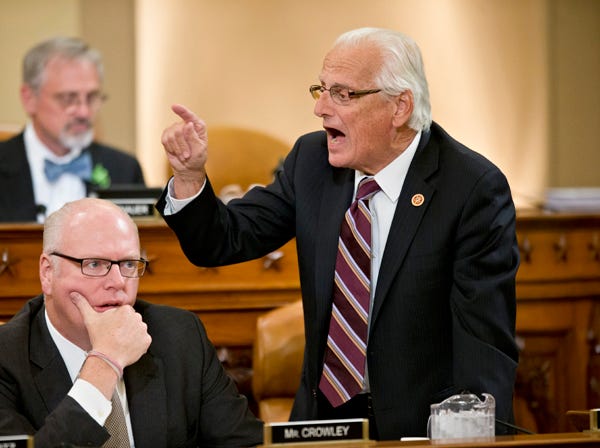 J. Scott Applewhite | Associated Press
House Ways and Means Committee member Rep. Bill Pascrell, D-N.J., right, stands up and shouts across the room at Republican lawmakers Tuesday during a heated debate about problems with the implementation of the Affordable Care Act. Rep. Joe Crowley, D-N.Y., is at left.