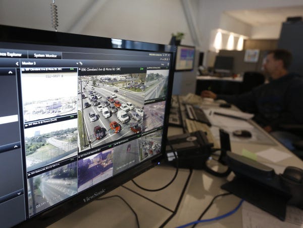 Operators in Columbus' new $3.4 million traffic-management center on E. 25th Avenue can tweak signal timing, monitor traffic flow and use GPS to track snowplows.