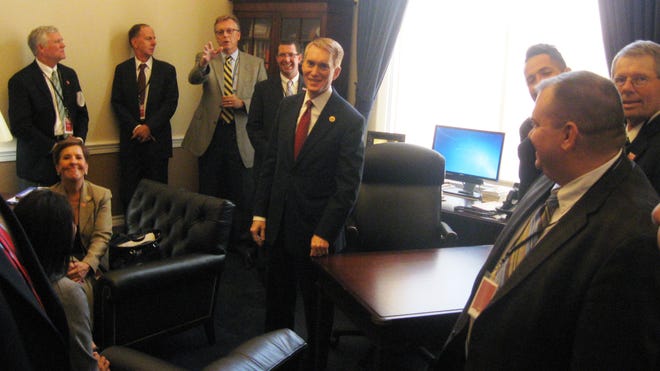 Rep. James Lankford, center, meets with Oklahoma business and evangelical leaders about immigration reform in his Capitol Hill office on Tuesday. PHOTO BY CHRIS CASTEEL, THE OKLAHOMAN Chris Casteel - The Oklahoman