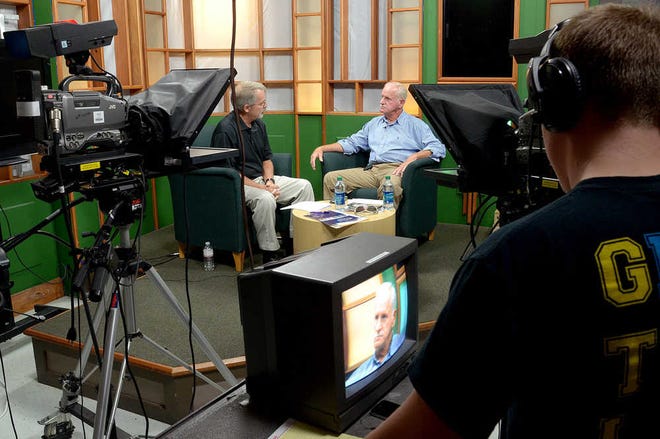 Nease High School senior Scott Jones tapes George McLatchey, left, interview former Nease High School principal Bob Schiavone about his experiences as a U.S. Marine fighting in the Viet Nam War in the Nease High School television studio on Oct. 24. By PETER WILLOTT, peter.willott@staugustine.com