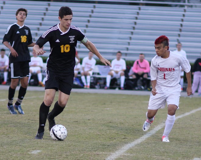 Havelock's Noah Kemble plays the ball against Jacksonville. Kemble scored Havelock's lone goal in the 3-1 loss to the Cardinals in the first round of the state playoffs.