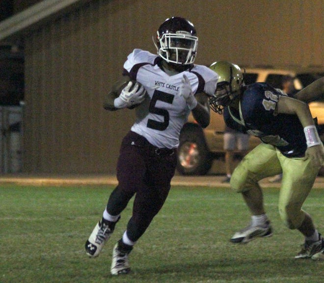White Castle's Daryl Young rushes against St. John earlier in the season. Young rushed for a touchdown and returned an interception for another in the Bulldogs' 66-6 District 8-1A victory over Ascension Christian on Friday night. 
POST SOUTH PHOTO/Peter Silas Pasqua