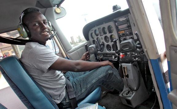 David Willis sits in a Cessna 172M after his first solo flight at Shelby-Cleveland County Regional Airport on his 16th birthday.