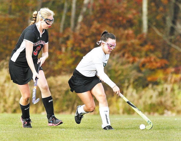 Dartmouth's Elissa Tetrault, right, keeps the ball from Wellesley defender Sophie Vernon.