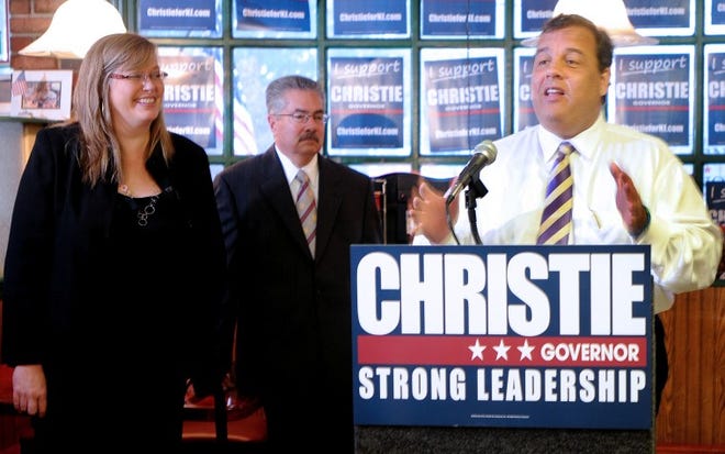 New Jersey Governor Chris Christie speaks during a campaign stop at Manny's Sicilia Ristorante in Palmyra. Attending were Palmyra Mayor Karen Scheffler, left, and Town Council President David Dorworth who both endorsed the Governor.