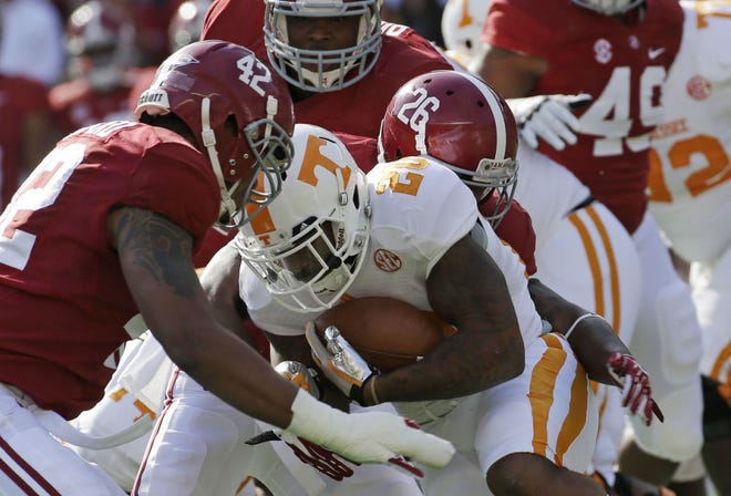 Tennessee running back Rajion Neal is averaging 95.4 yards a game and 5.3 yards a carry this season, but those numbers dip to 75.8 and 4.3 against BCS-conference opponents.