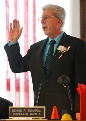 Ward five City Councilor Dennis DeNapoli is sworn in during the inauguration ceremony at Brockton City Hall on Monday, Jan. 2, 2012.