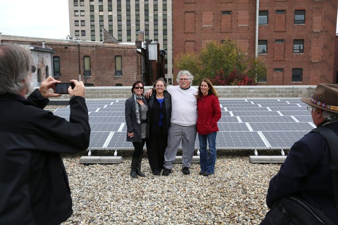 A 50-panel solar array was activated on the roof of Maldaner's Restaurant Friday, Nov. 1, 2013, and chef-owner Michael Higgins posed for a picture with those who helped get the project accomplished. From left are Michelle Knox of WindSolar USA, Wynn Coplea, Illinios Green Economy Network, Higgins and Julie Rourke with Lincoln Land Community College.