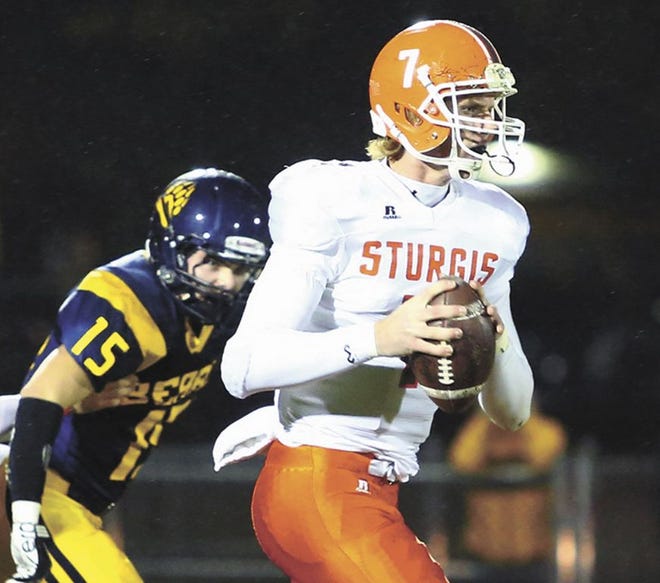 Joe Rondone/Herald Palladium
Sturgis quarterback Chance Stewart moves up in the pocket to complete a pass Friday in a 16-0 loss to 
St. Joseph in the opening round of the playoffs.