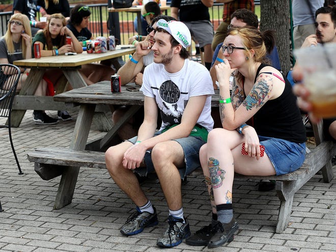 Music fans listen to a show at The Lunchbox during Fest 12 on Friday in Gainesville.