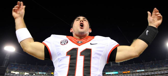AJ Reynolds Athens Banner-Herald  Georgia quarterback Aaron Murray celebrates after their win over Florida on Saturday at EverBank Field.