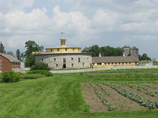 A Shaker religious community has been reconstructed complete with the round barn, growing crops and costumed re-enactors.