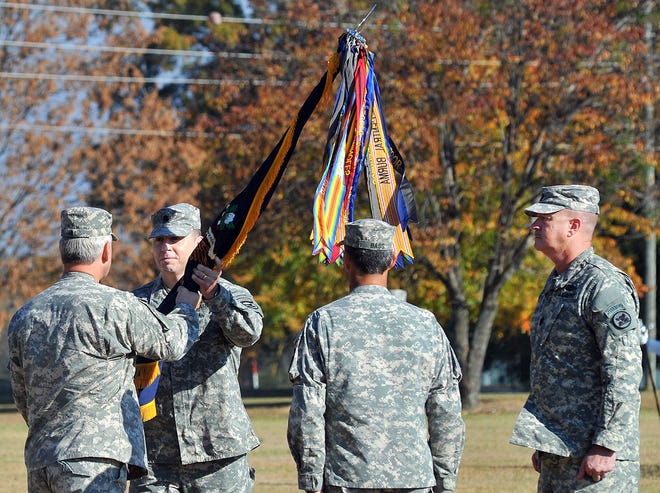 COL John B. Hill passes the colors of the 4th Alabama on Sunday during a change of command ceremony for the 1-167th Infantry Battalion “4th Alabama” Army National Guard unit in Anniston.