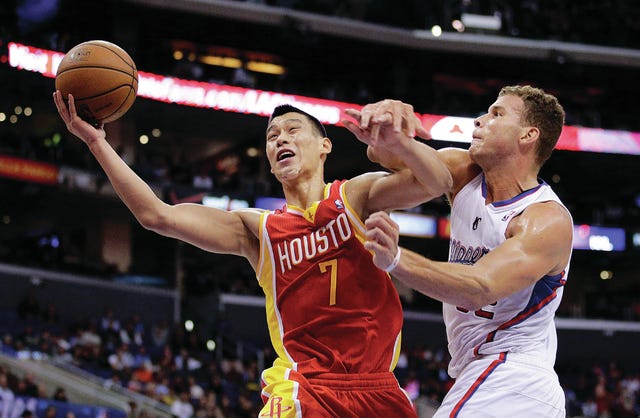 Houston Rockets’ Jeremy Lin, left, is defended by Los Angeles Clippers’ Blake Griffin during the second half Monday, in Los Angeles. The Clippers won 137-118. AP Photo/Jae C. Hong