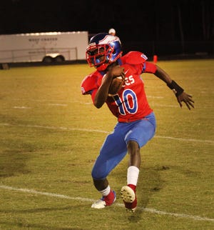 West Craven‘s Alkeim Harley turns the corner during a game against West Carteret earlier this season. The Eagles host Havelock on Friday with a chance to claim a share of the Coastal Conference.