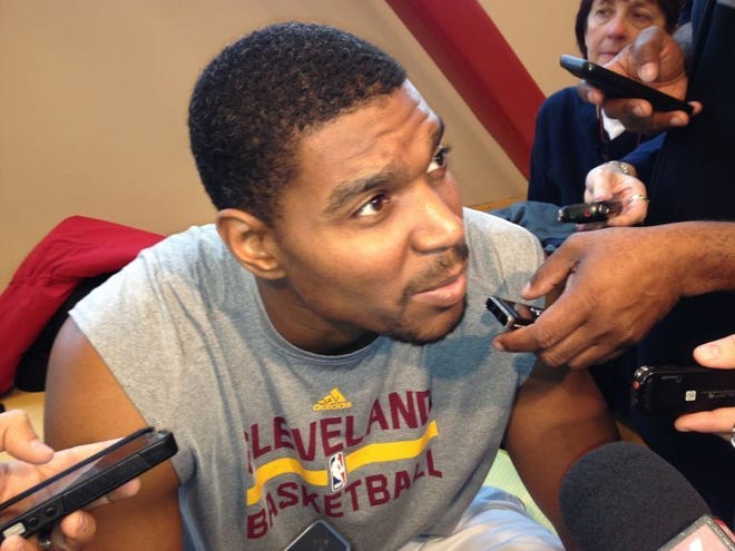 Cavaliers center Andrew Bynum answers a reporter's question during a media availability after practice Thursday at Temple.