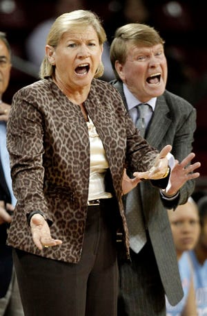 North Carolina associate head coach Andrew Calder, right, will take over for the Tar Heels while coach Sylvia Hatchell receives treatment for leukemia.