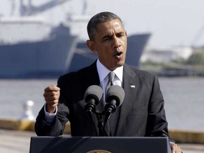 President Barack Obama speaks at the Port of New Orleans on Friday. The president said he'll do everything he can to help people coping with health insurance cancellations, but legally and practically his options appear limited. 
 (AP PHOTO)