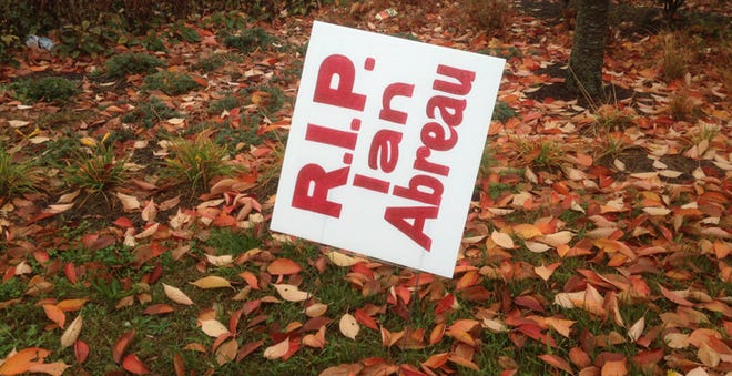 Campaign-style "R.I.P. Ian Abreau" signs appeared all over the city, including one in front of his mother's house. Abreu's name is misspelled on the signs.
Nov. 7, 2013 Jack Spillane / The Standard-Times Campaign-style "R.I.P. Ian Abreau" signs appeared all over the city, including one in front of his mother's house. Abreu's name is misspelled on the signs.