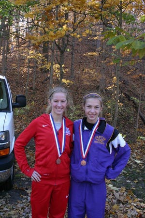 Ericka Hibser, at left, 17th in state cross country meet; Nicole Beebe, 20th in state cross country meet