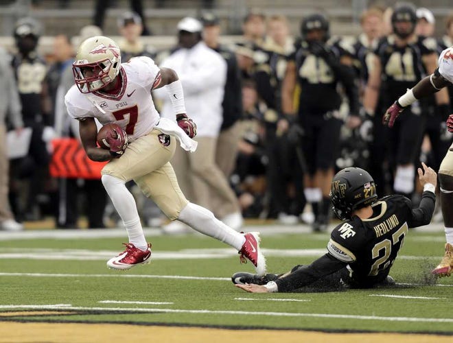Nell Redmond Associated Press Florida State's Levonte "Kermit" Whitfield gets past Wake Forest kicker Chad Hedlund on the way to a touchdown in the second half on Saturday in Winston-Salem, N.C.