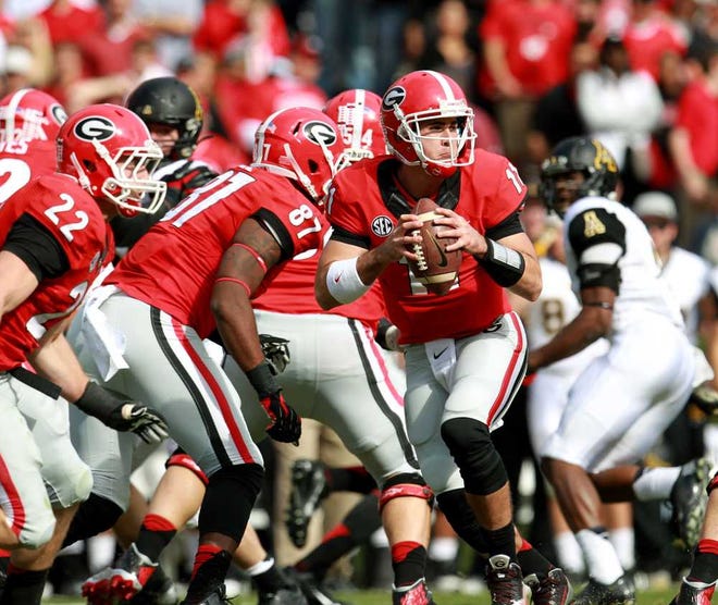 Jason Getz Atlanta Journal-Constitution  Georgia quarterback Aaron Murray became the SEC's all-time career touchdown pass leader, passing Danny Wuerrfel.