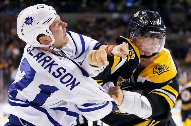 Toronto's David Clarkson and the Bruins' Jarome Iginla exchanged blows Saturday night.