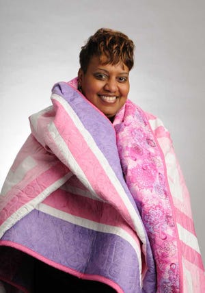Dede.Smith@jacksonville.com Anissa Wheelock of Jacksonville is the winner of the Project Pink "We're Here to Help 2013" quilt raffle.