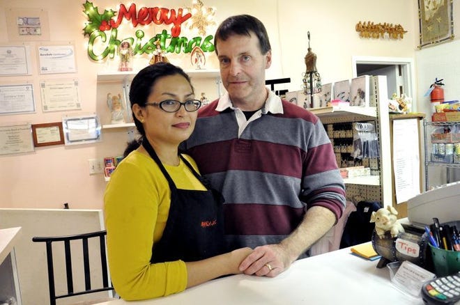 Mount Laurel Arlyn Baker and her husband Neil seen here at Manila Cafe & Asian Mart in Mount Laurel wait anxiously to hear word on family members in Baybay, Leyte in the Philippines