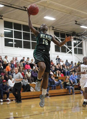 Nease's Sydney Searcy with a layup during the first half of high school girls' basketball action at St Augustine High School on Thursday, January 17, 2013. By GARY McCULLOUGH, Special to The Record