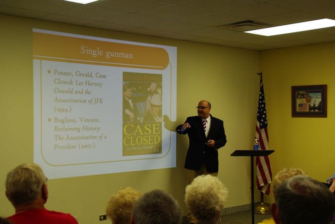 Dr. Justin Coffey, associate professor of history at Quincy University, gave a presentation marking the 50th anniversary of former President John F. Kennedy’s assassination at the Parlin-Ingersoll Library on Tuesday. He covered a range of topics from his family to 
his politics.