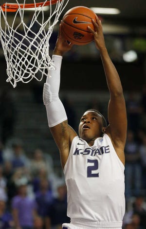 Kansas State's Marcus Foster throws down a dunk during the second half of the Wildcats' 71-63 victory over Oral Roberts on Wednesday in Manhattan. The freshman guard scored 25 points.