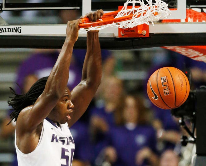 Kansas State's D.J. Johnson dunks during the first half against Oral Roberts on Wednesday. Johnson scored 12 on 5-of-7 shooting with a team-high seven rebounds in the victory.
