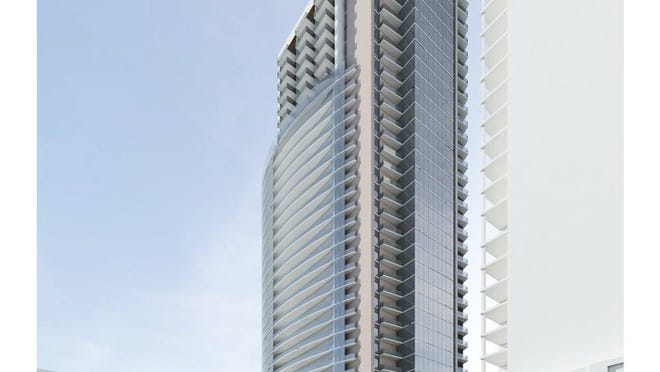 An artists rendering of the proposed apartment tower at Cesar Chavez and Trinity streets in Austin. The developer says the rendering is conceptual, and the building’s design is subject to change.Rendering by Gromatzky Dupree & Associates