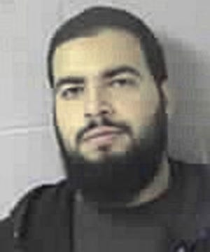 This Wednesday, Oct. 21, 2009, file booking photo provided by the Sudbury Police Dept. shows Tarek Mehanna, of Sudbury, convicted in 2012 of four terror-related charges. Mehanna will be in a federal court in Boston where his defense will present arguments to appeal the verdict.