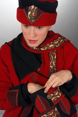 Cindy Walsh's fleece fabrics wrap men, women and children in the warmth and comfort we're all looking forward to as we prepare for another New England winter. You're sure to find the perfect jacket and accessories for whoever may be on your list this year.
"Snake Charmer".
