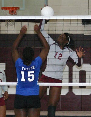 White Castle’s Alaina Williams attacks the net against Patrick Taylor in the postseason last year. The Lady Bulldogs fell to Runnels 25-21, 15-25, 25-20, 25-22 in the Division V bi-district round Nov. 6. 
POST SOUTH PHOTO/Peter Silas Pasqua