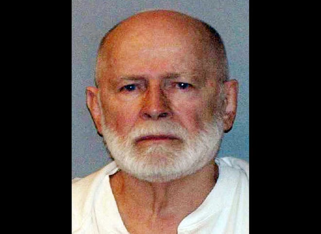 FILE - This June 23, 2011 booking file photo provided by the U.S. Marshals Service shows gangster James "Whitey" Bulger. Federal prosecutors argued Thursday, Nov. 7, 2013 that Bulger "deserves no mercy" and asked a judge to sentence him to two consecutive life sentences, plus five years, in a string of murders and extortions. Bulger, the 84-year-old former leader of the notorious Winter Hill Gang, was convicted in August after spending more than 16 years on the run. (AP Photo/ U.S. Marshals Service, File)
