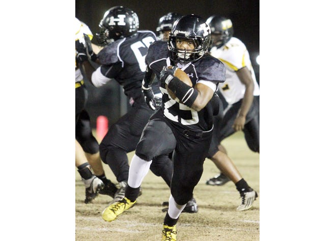 Havelock's Taylor Woods runs with the ball against Topsail on Friday night. Woods rushed for 163 yards, including a 93-yard touchdown run, as the Rams won 48-0.