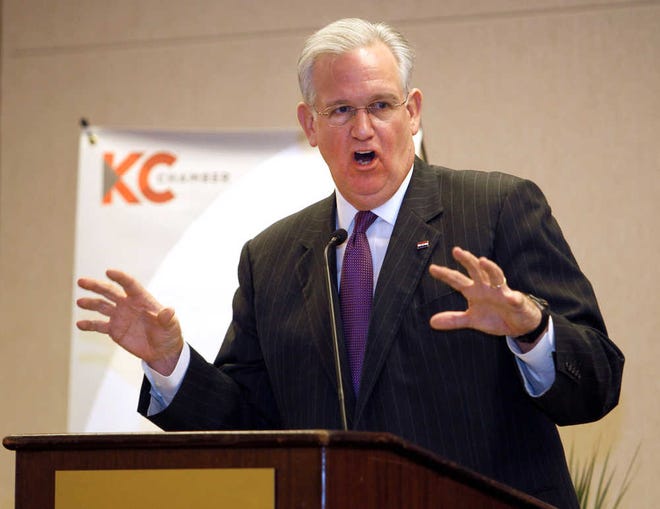 Missouri Gov. Jay Nixon speaks Tuesday in Kansas City, Mo., before the Greater Kansas City Chamber of Commerce. Nixon called for a moratorium on using tax incentives to lure companies across the state line between Kansas and Missouri in the Kansas City metropolitan area. In his speech Nixon said he had reached out to the administration of Kansas Gov. Sam Brownback to persue legislation that would make a moratorium permanent.
