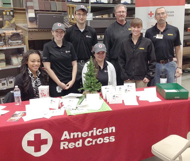 The American Red Cross recently hosted a Holiday Mail for Heroes card signing at Loweís in Lansing.

Courtesy photo