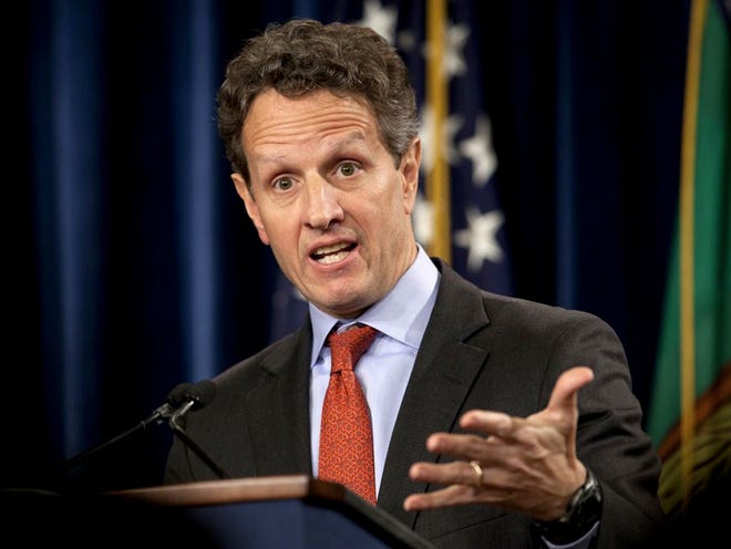 This Feb. 2, 2012 file photo shows then Treasury Secretary Timothy Geithner during a news conference at the Treasury Department in Washington. The former U.S. Treasury Secretary is joining private equity firm Warburg Pincus LLC. The firm announced Saturday, Nov. 16, 2013, that Geithner will serve as president and managing director of the firm starting March 1, 2014. Geithner played a central role in devising the U.S. government's response to the financial crisis of 2008-2009. (AP Photo/Carolyn Kaster, file)