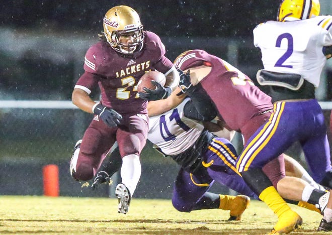 St. Augustine's Patrick Stewart gets around the defense in Friday's loss against Columbia