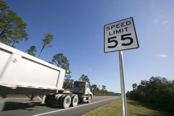 Motorists travel east on SR 40 in the Ocala National Forest on Thursday 14, 2013. A bill has been introduced that would raise the speed limit on this and the interstate and other similar rural roads.