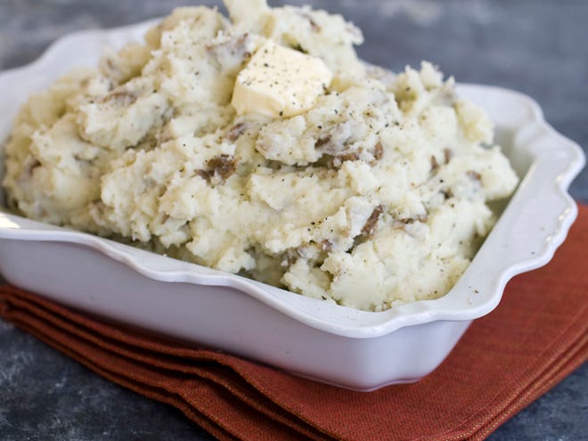 This Oct. 21, 2013 photo shows a classic mashed potato recipe for the Thanksgiving holiday in Concord, N.H. (AP Photo/Matthew Mead)