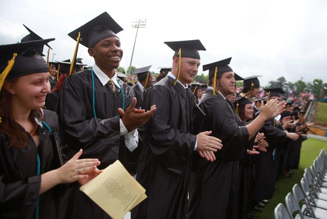Members of the Kings Mountain High School Class of 2013 celebrate during a June ceremony. (Star file photo)
