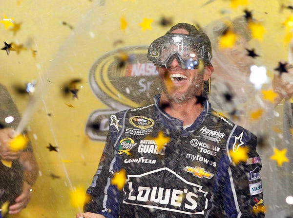 Jimmie Johnson celebrates after winning his sixth NASCAR Sprint Cup Series title Sunday night.
 (Terry Renna | Associated Press)